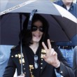 Michael and his children leave the Beverly Hills Hotel