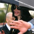 Michael and his children leave the Beverly Hills Hotel