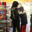 Michael and his children visits Tom's Toys