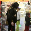 Michael and his children visits Tom's Toys