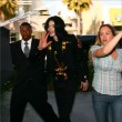 Michael and his children visits Tom's Toys