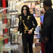 Michael and his children visits Tom's Toys