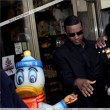 Michael and his children visits Tom's Toys