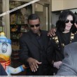 Michael and his children visits Tom's Toys