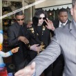 Michael and his children visits Tom's Toys