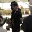 Michael and his children visits Tom's Toys