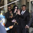 Michael and his children visits Tom's Toys
