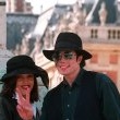 Michael and Lisa Marie Presley visit the Chateau de Versailles in France.