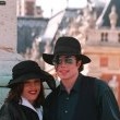 Michael and Lisa Marie Presley visit the Chateau de Versailles in France.