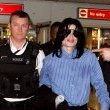 Michael arrives at Heathrow Airport in London.