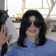 Michael arrives at Heathrow Airport in London.