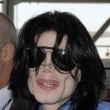 Michael arrives at Heathrow Airport in London.