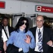 Michael arrives at Heathrow Airport in London.