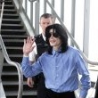 Michael arrives at Heathrow Airport in London.