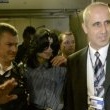 Michael arrives at Heathrow Airport in London.