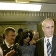 Michael arrives at Heathrow Airport in London.