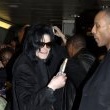Michael arrives at Heathrow Airport in London.