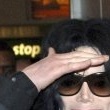 Michael arrives at Heathrow Airport in London.