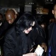 Michael arrives at Heathrow Airport in London.