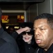 Michael arrives at Heathrow Airport in London.
