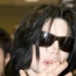 Michael arrives in Tokyo, Japan at Narita International Airport.