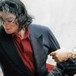 Michael attends a demonstration against Sony Music.