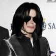 Michael attends his long-time friend, Jesse Jackson's 66th Birthday Party in LA.
