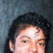 Michael attends the BPI Record Industry Awards in London to collect an award on behalf of Barbra Streisand.