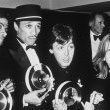 Michael attends the BPI Record Industry Awards in London to collect an award on behalf of Barbra Streisand.