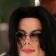 Michael Attends the funeral of former lawyer Johnny Cochran.