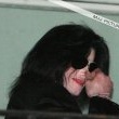 Michael fans from his balcony at the Hempel Hotel in Bayswater London.