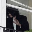 Michael fans from his balcony at the Hempel Hotel in Bayswater London.