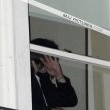 Michael fans from his balcony at the Hempel Hotel in Bayswater London.