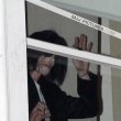 Michael fans from his balcony at the Hempel Hotel in Bayswater London.