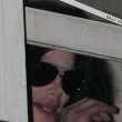Michael fans from his balcony at the Hempel Hotel in Bayswater London.