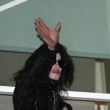 Michael fans from his balcony at the Hempel Hotel in Bayswater London.