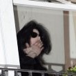 Michael fans from his balcony at the Hempel Hotel in Bayswater London.