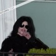 Michael fans from his balcony at the Hempel Hotel in Bayswater London.