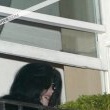 Michael fans from his balcony at the Hempel Hotel in Bayswater London.