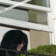 Michael fans from his balcony at the Hempel Hotel in Bayswater London.