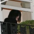 Michael fans from his balcony at the Hempel Hotel in Bayswater London.