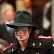 Michael inaugurates a wax statue of himself at the Grevin museum in Paris.