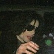 Michael is bombarded by fans at the Carlton Towers in London.