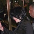 Michael is bombarded by fans at the Carlton Towers in London.