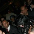Michael is bombarded by fans at the Carlton Towers in London.