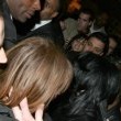 Michael is bombarded by fans at the Carlton Towers in London.