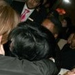Michael is bombarded by fans at the Carlton Towers in London.