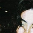 Michael is seen helping an elderly woman after a shopping trip at Harrods.