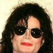 Michael Jackson announces that he will perform at a concert that will benefit the Children of Korea.