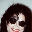 Michael Jackson announces that he will perform at a concert that will benefit the Children of Korea.